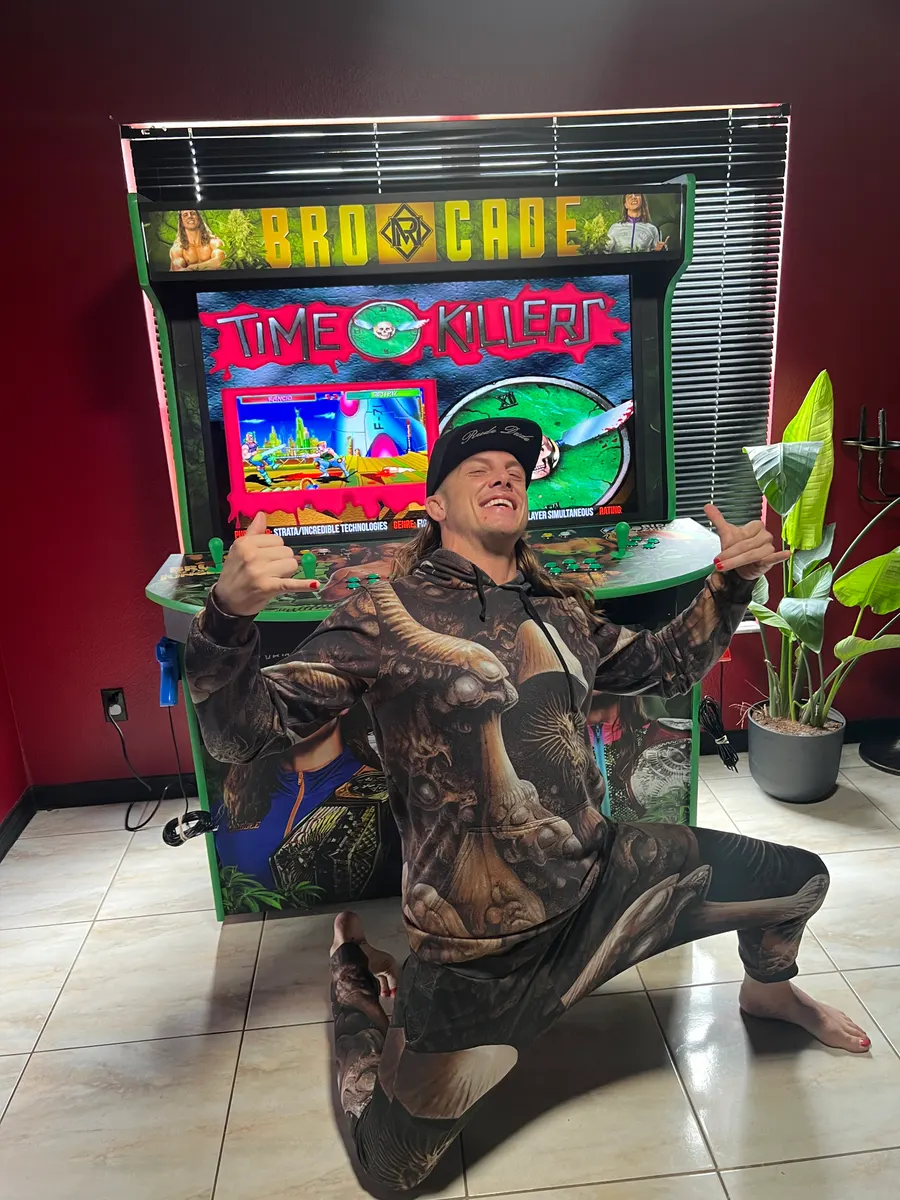 Matt Riddle with the finished Bro-Cade arcade