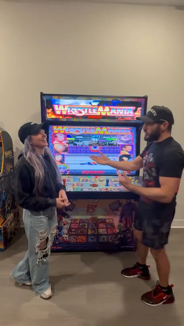 Johnny Gargano & Candice LeRae with the finished Johnny Gargano & Candice LeRae arcade